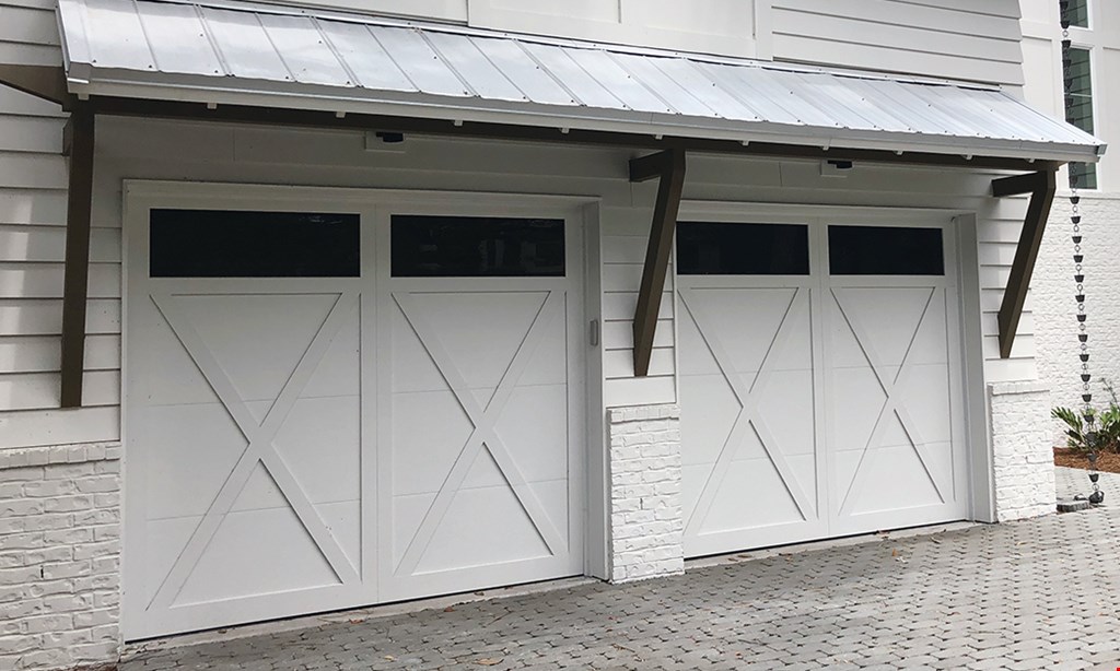 Product image for America's Garage Doors, llc $280 Garage Door Overhaul includes two springs and rollers
