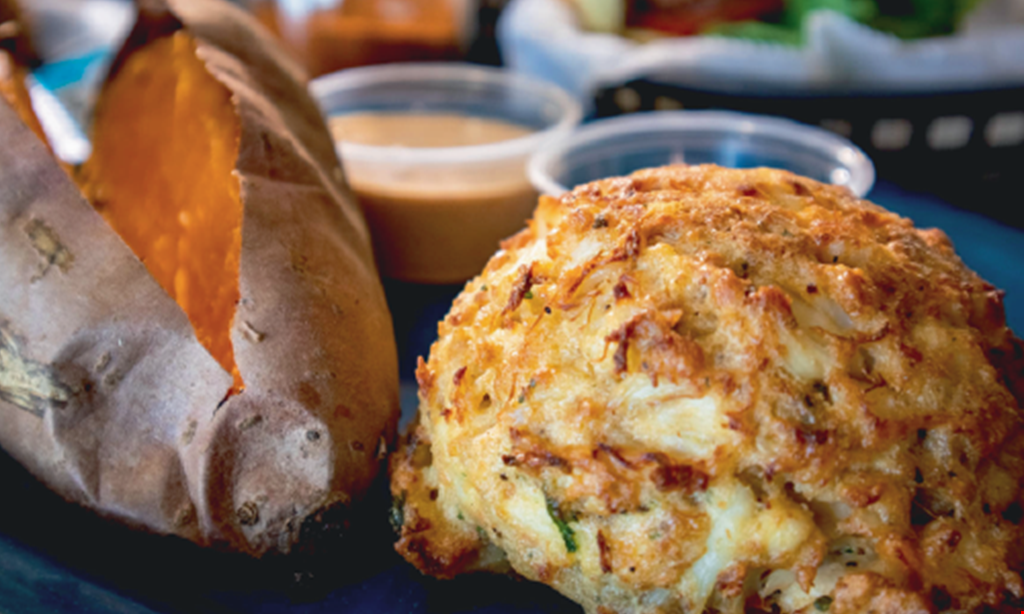 Product image for The Crab Cake Company $2 Off giant crab pretzel supreme. 