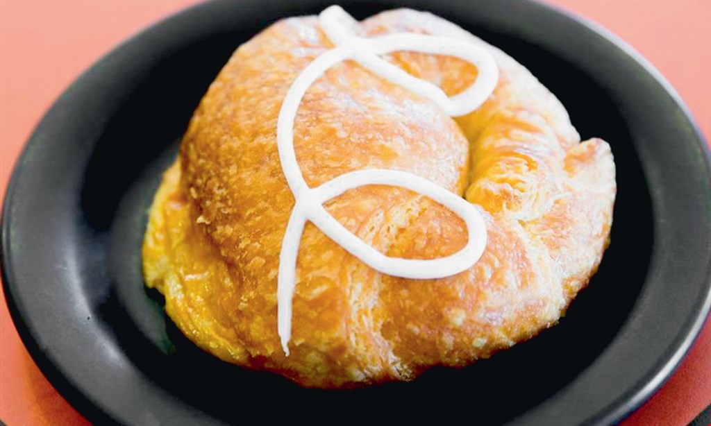 Product image for P. Croissant $1 OFF Any Breakfast Sandwich.