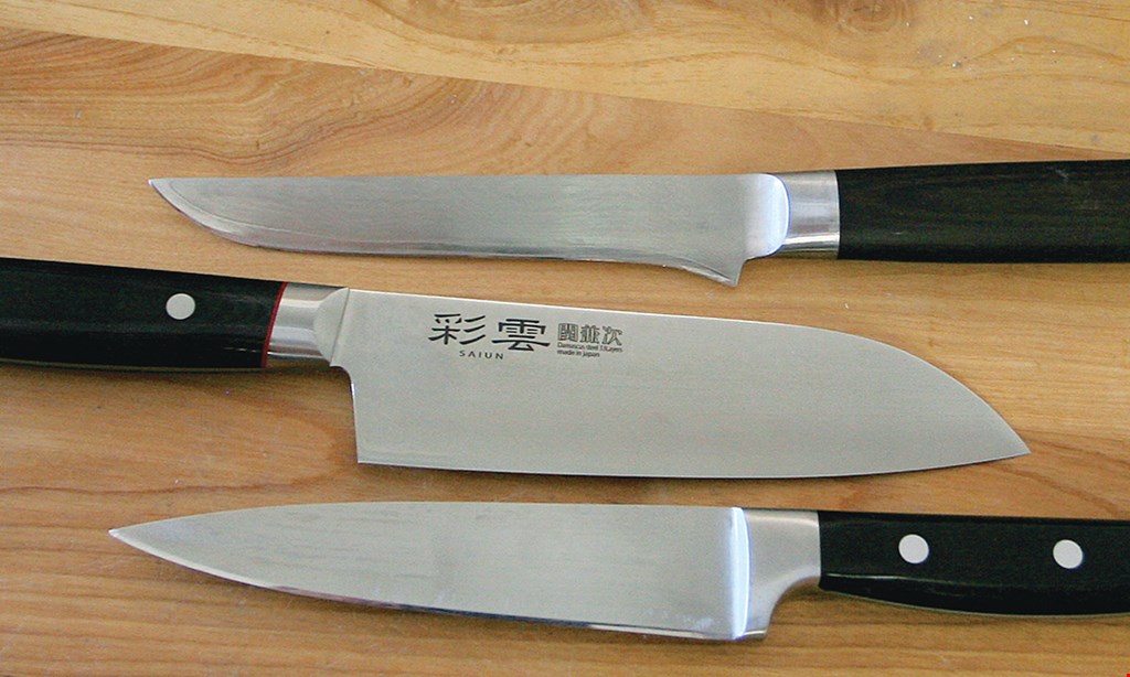 Product image for Juan The Sharpener 2 FREE knife sharpenings. Sharpen 10 knives at reg. price, get the 11th & 12th knives sharpened for free. 