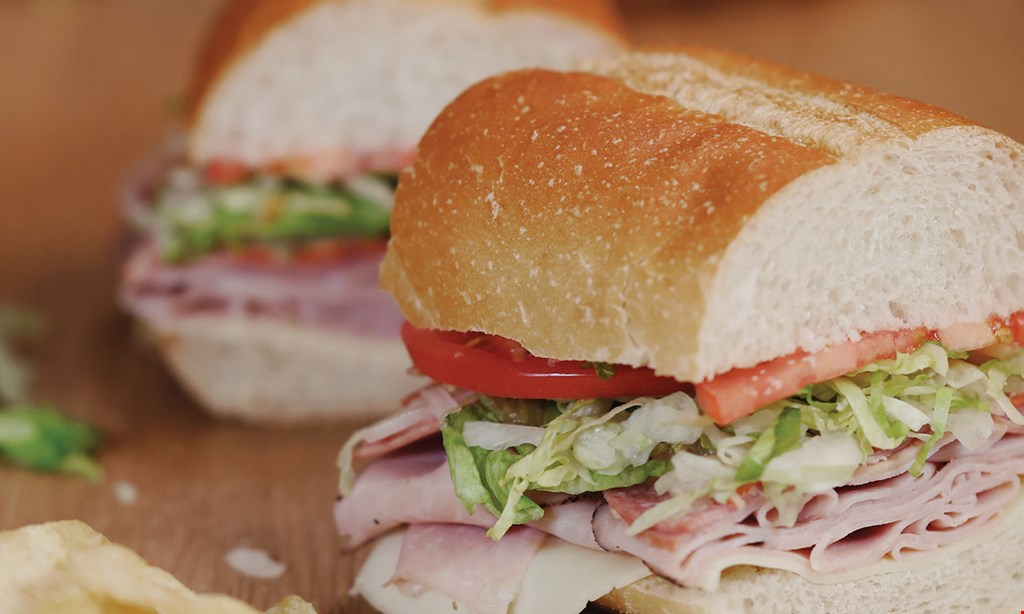 Product image for Jersey Mike's Subs $13.99 meal deal! Tax not included. Giant sub 1 chip & (1) 22oz fountain drink. 