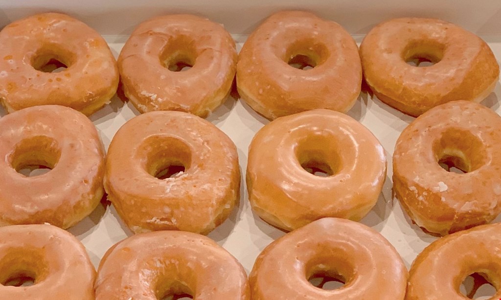 Product image for Gerald's Donuts & Burgers $1 OFF any dozen donuts. 