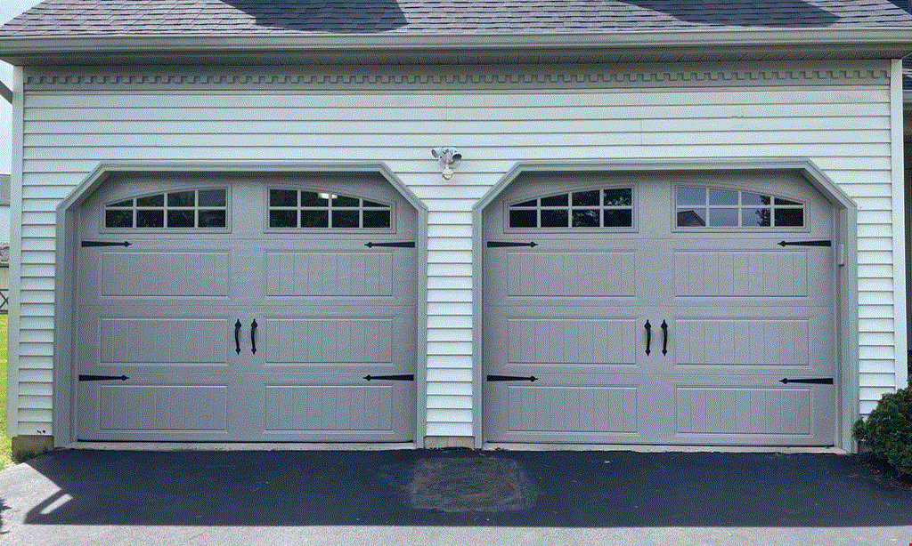 Product image for Legacy Door Co. $100 off any insulated door installation.