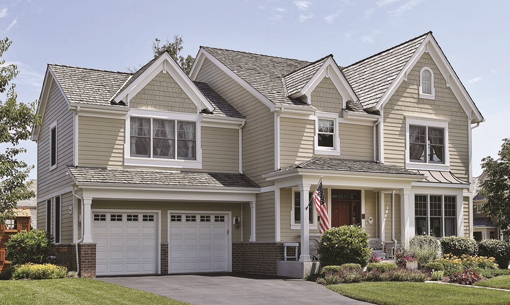 Product image for Carmody Construction Company $900 off complete siding job. 
