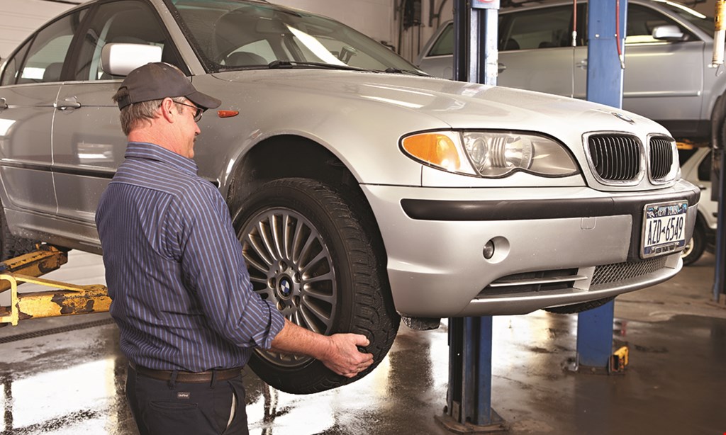 Product image for WARREN TIRE $20 off alignment check. 