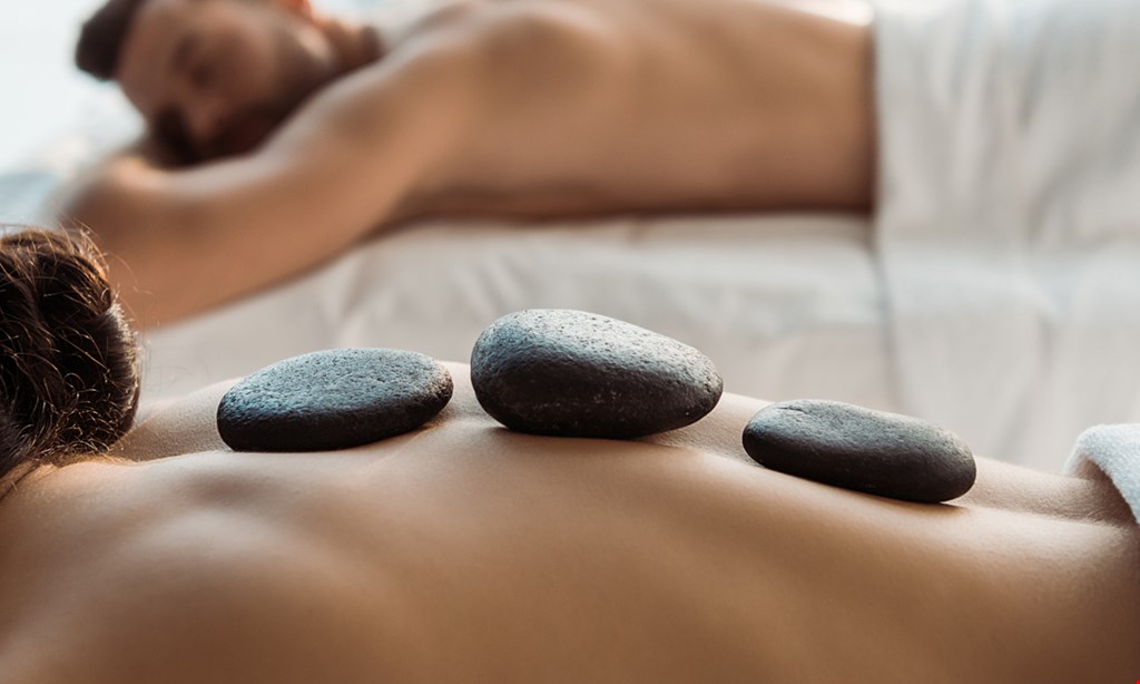 Product image for The Secret Garden Wholistic Inc $82.50 for a One Hour Couples Massage with Himalayan Salt Stones or Classic Stones ($165 value)
